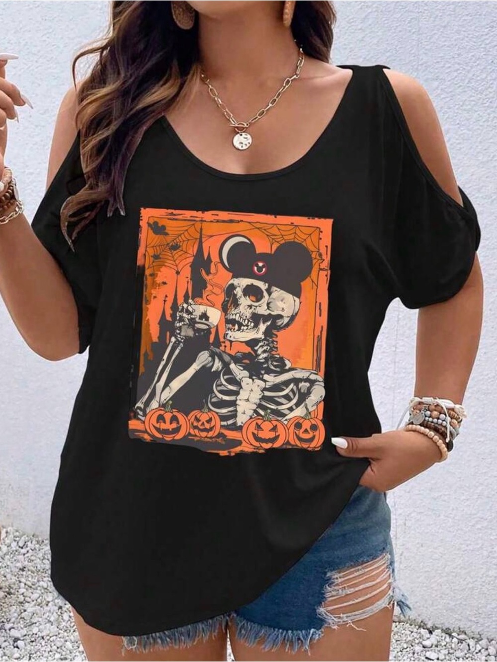 Cold shoulder Disney Skeleton top. New, no tags.